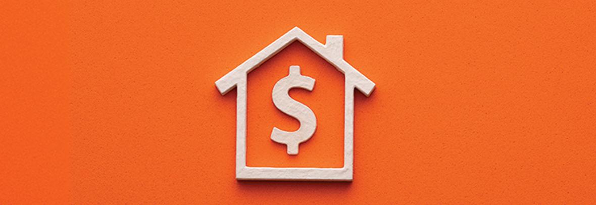 small wooden house shape with a dollar sign inside on orange background
