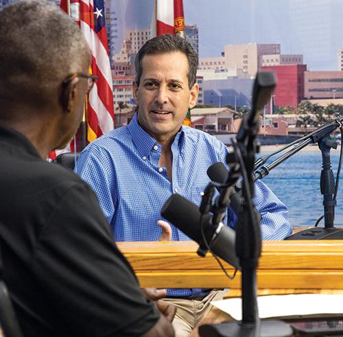 Photo of Hal Feldman on set of his community podcast