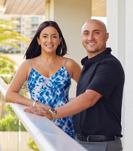 Photo of Margo and Alex Platt on a balcony