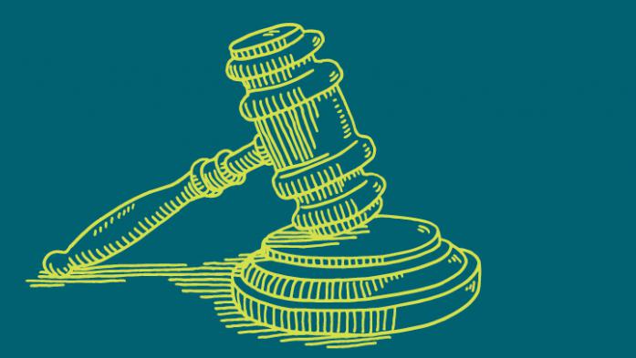 illustration of a gavel in green on a blue background