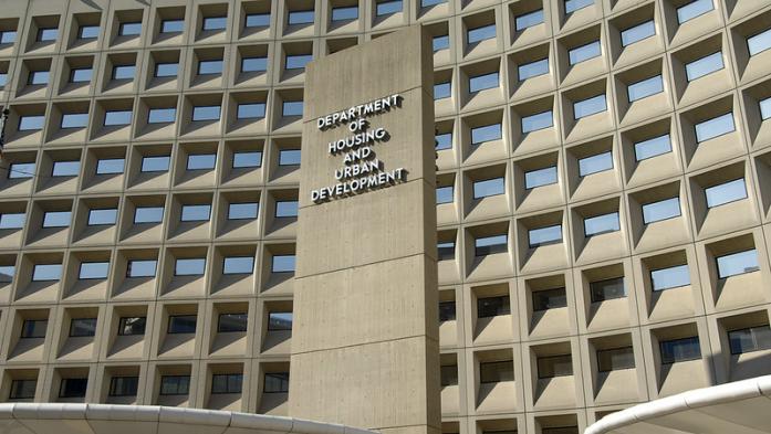 Image of the facade of the HUD building in DC. The building has the words "Department of Housing and Urban Development" on the front 