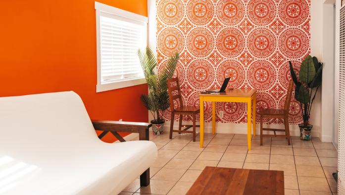 Orange living room city apartment.